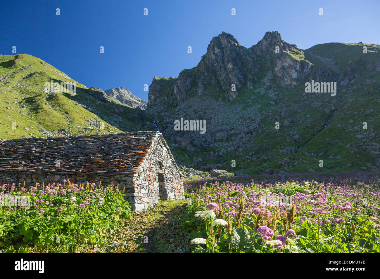 Switzerland, Europe, mountain, mountains, canton, Valais, hut, alp hut, stone hut, Lac de Louvie, Grand Combin, Petit Combin Stock Photo