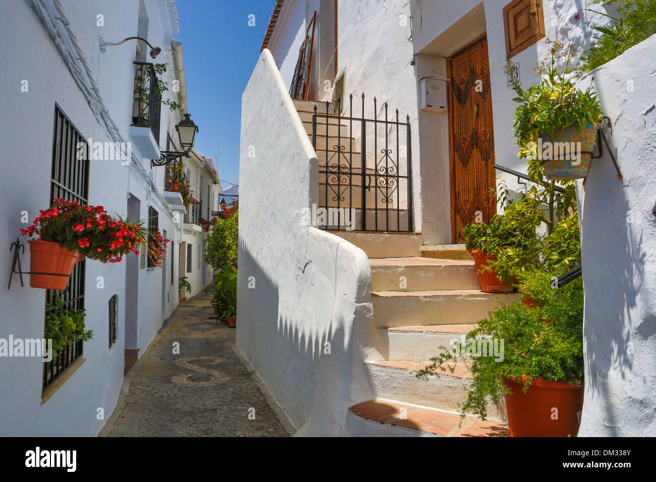 Frigiliana, Malaga, Andalusia, city, Spain, Europe, street, terrace, touristic, travel, white, Stock Photo