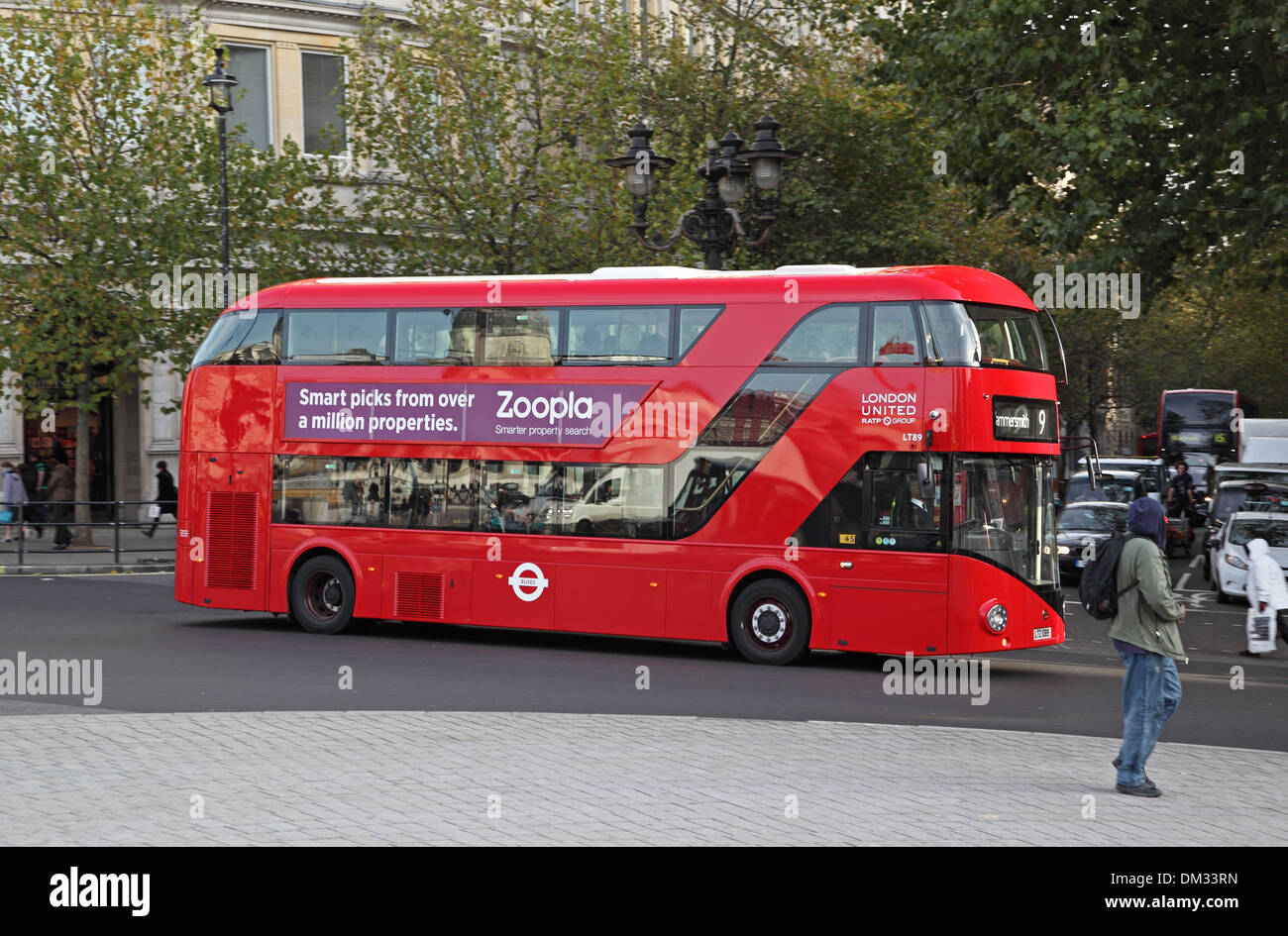 A new Routemaster bus drives through London's Trafalgar Square Stock Photo