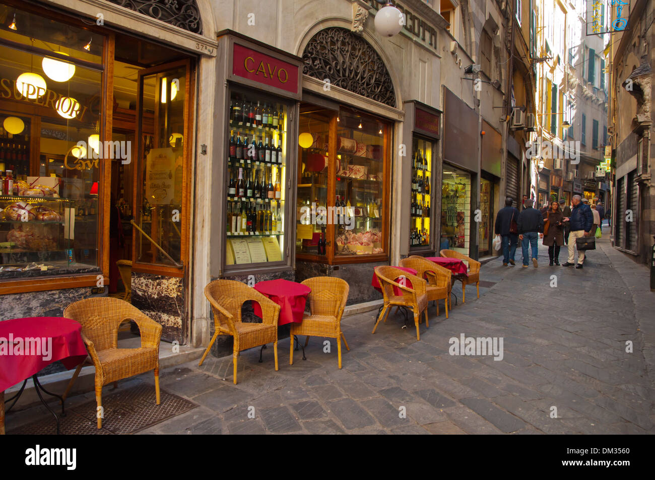 Alley with a cafe terrace centro storico old town Genoa Liguria region Italy Europe Stock Photo