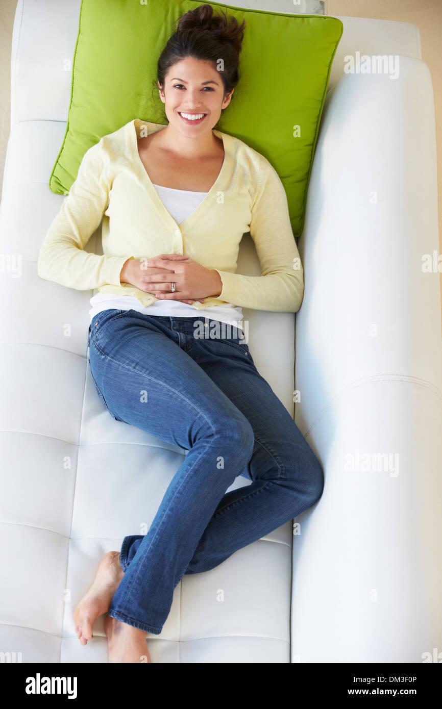 Overhead View Of Woman Relaxing On Sofa Stock Photo Alamy
