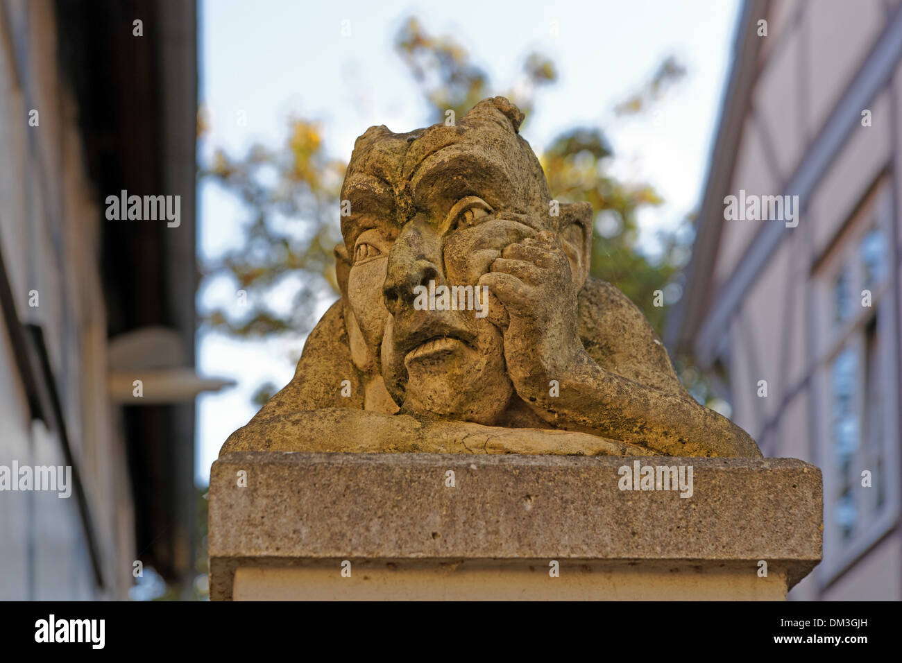 Europe Germany Lower Saxony Celle Mauernstrasse old postal court entrance pillar figures detail curiosity place of interest Stock Photo
