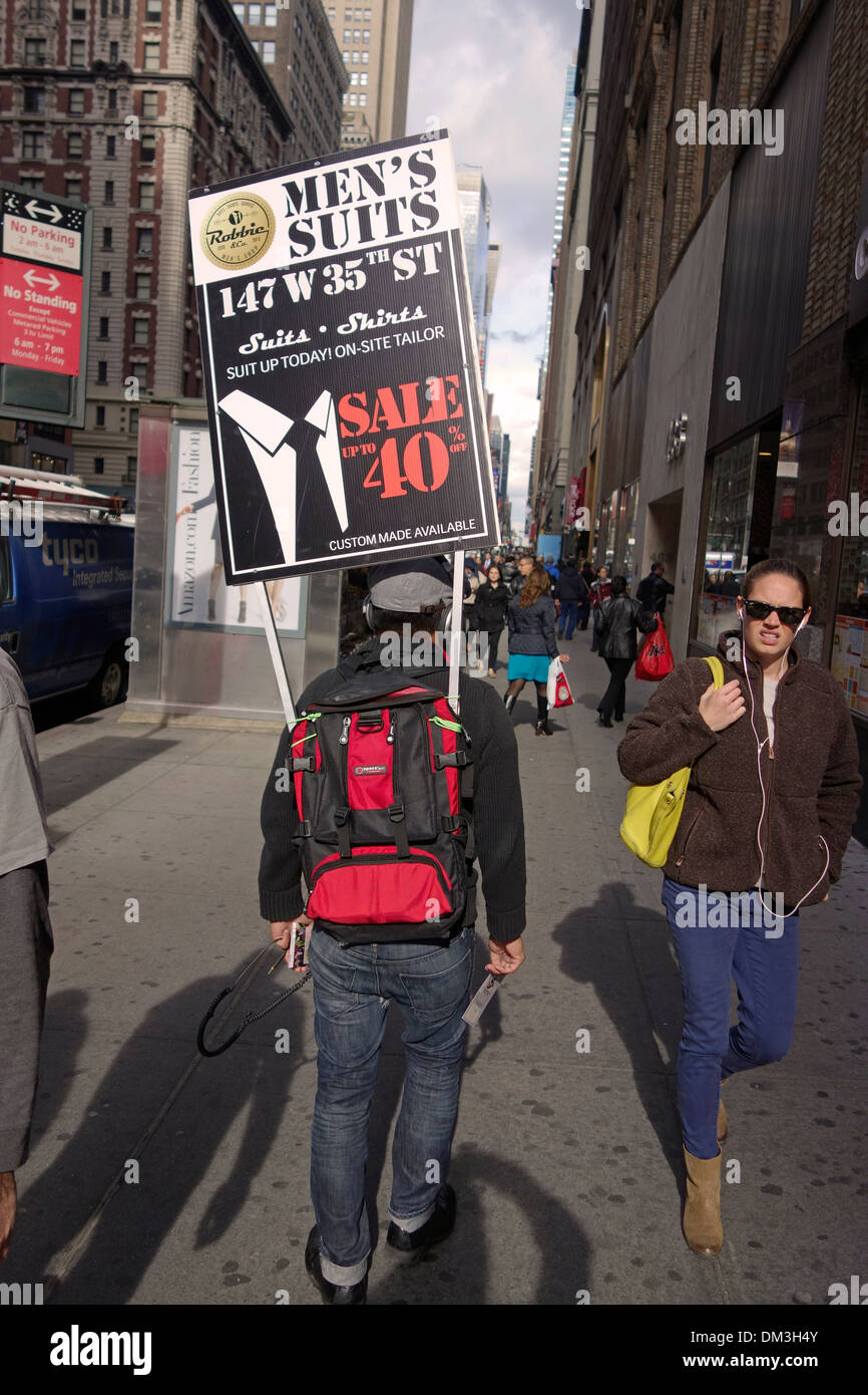 Old man walking near board with posters on street · Free Stock Photo