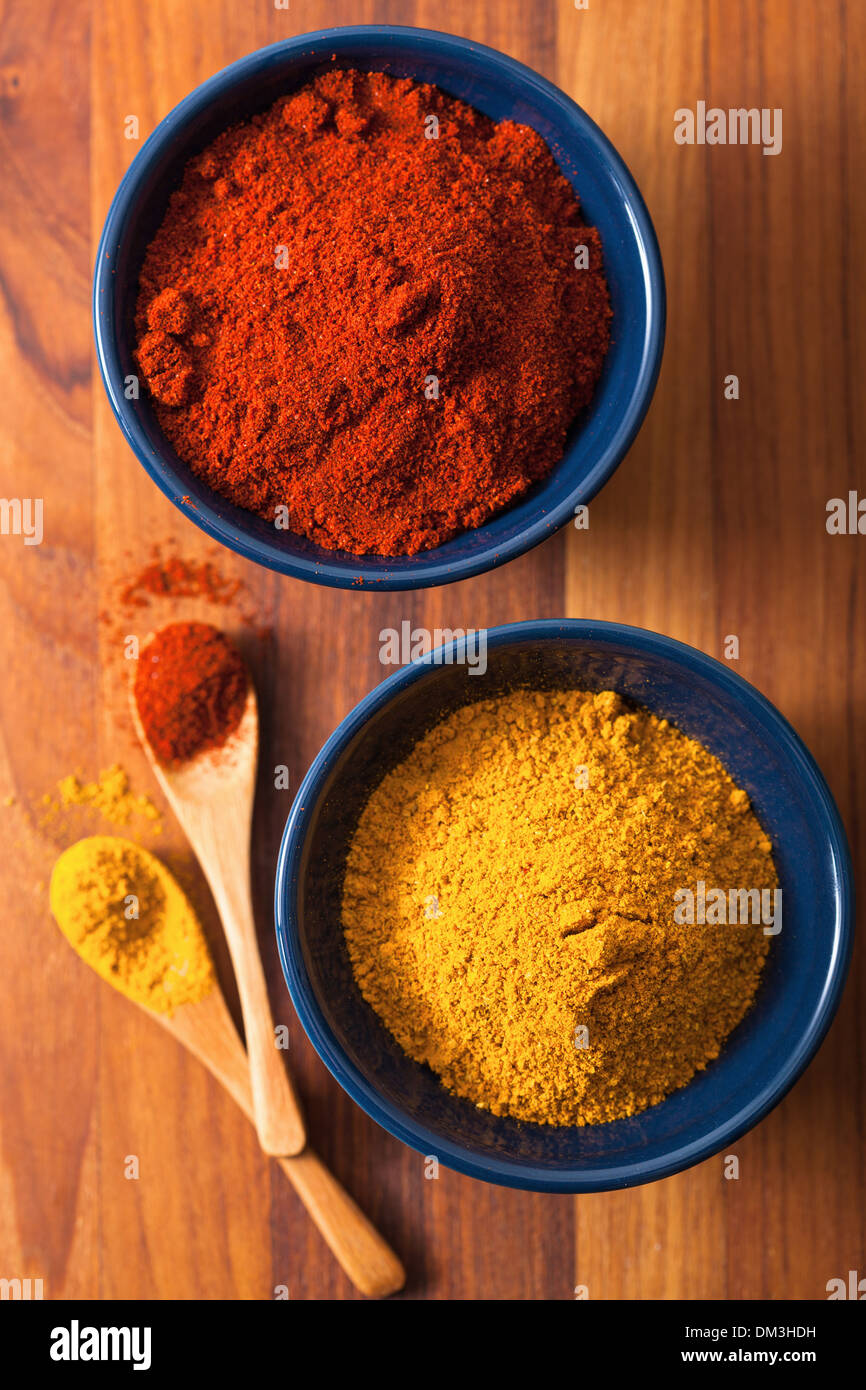 spices in bowls: curry and paprika powder Stock Photo