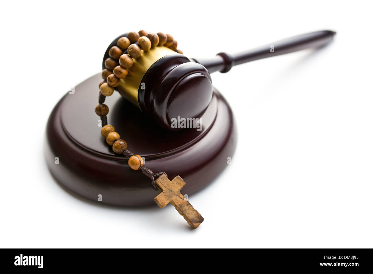 judge's gavel and rosary beads on white background Stock Photo