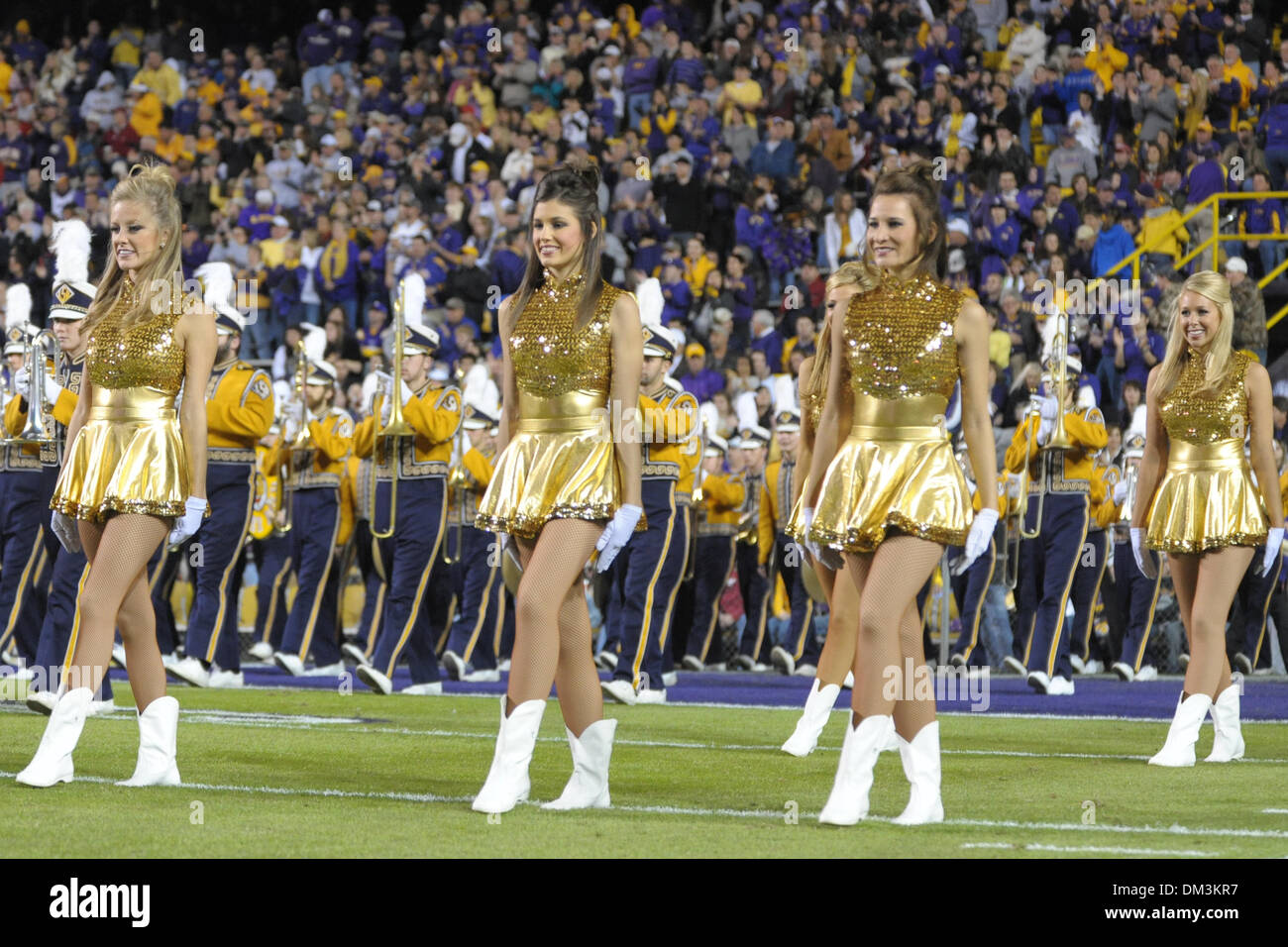 The Golden Girls take the field with the LSU Band prior to an SEC Stock