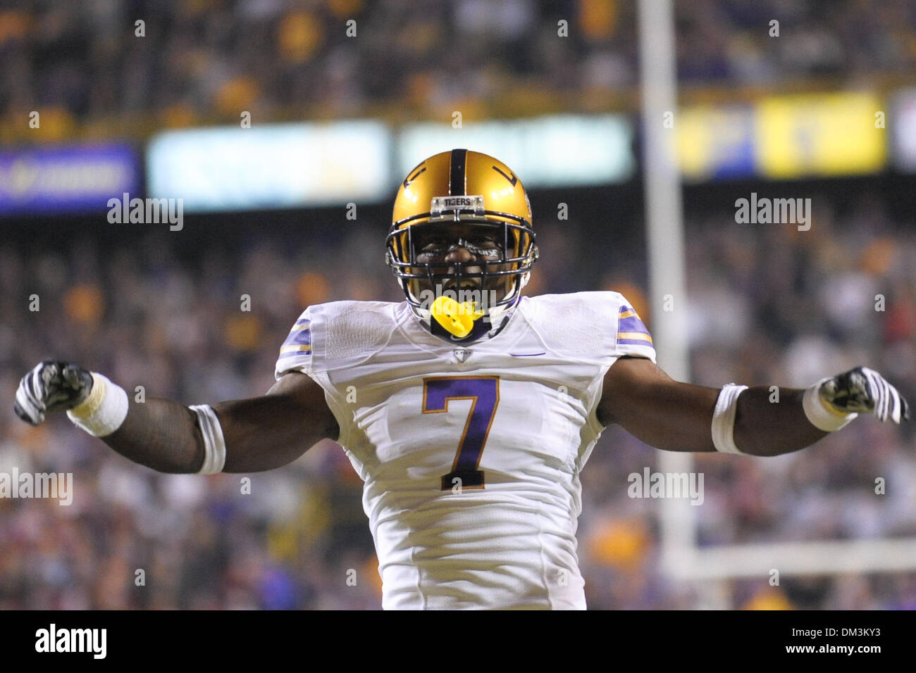 LSU defensive back, #7 Patrick Peterson, celebrates during an SEC West game  between the Arkansas Razorbacks and the LSU Tigers in Tiger Stadium. LSU  would win the game in overtime, 33-30. (Credit
