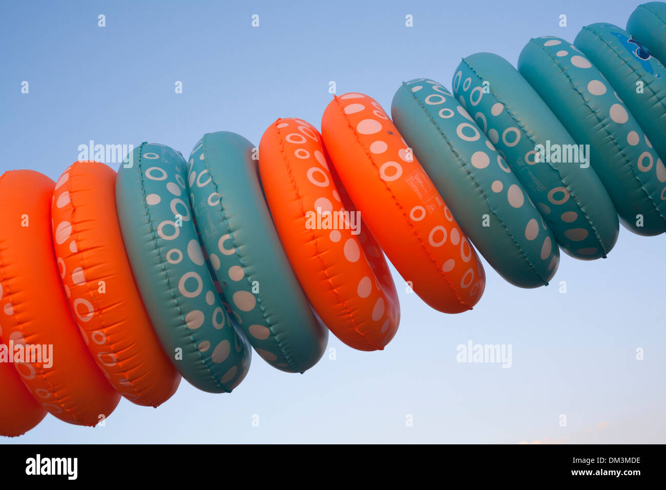 Swimming rings hanging on a line Stock Photo Alamy