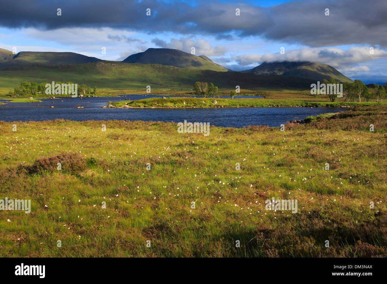 Mountain mountains water summits peaks Glen Coe Glencoe Great Britain Europe Highland highlands sky scenery Loch Loch Ba Loch Stock Photo