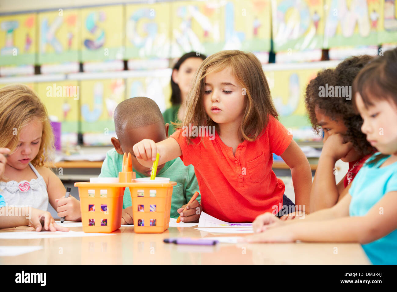 Group Of Elementary Age Children In Art Class With Teacher Stock Photo ...