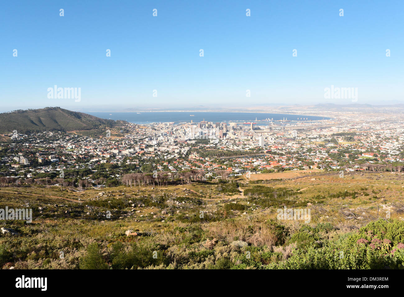Aerial view of Cape Town CBD with Table Bay and Signal Hill in the background, viewed from the slopes of Table Mountain Stock Photo