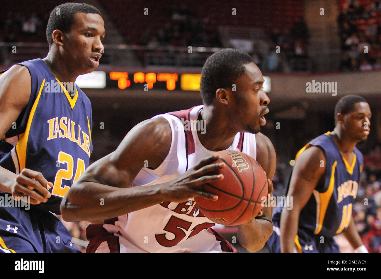 Temple forward/center Micheal Eric #50 rebounds the ball while La Salle center Aaric Murray #24 watches. Temple defeated Lasalle 84-75 in a game being played at The Liacouras Center in Philadelphia, Pennsylvania. (Credit Image: © Mike McAtee/Southcreek Global/ZUMApress.com) Stock Photo