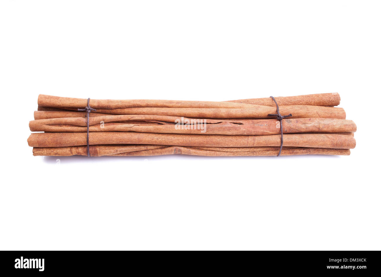 Cinnamon sticks tied by rope Stock Photo