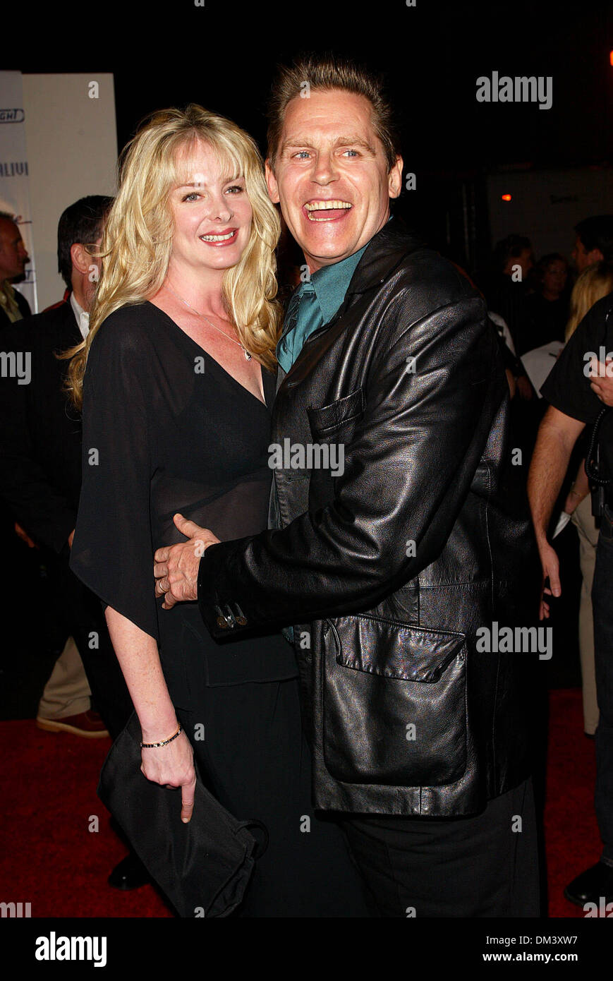 Sept. 24, 2002 - Los Angeles, CALIFORNIA - THE MOVIES THAT DEFINED THEIR GENERATION.GREASE, SATURDAY NIGHT FEVER AND.STAYING ALIVE DVD RELEASE PARTY.ON THE PARAMOUNT STUDIOS BACK LOT IN LOS ANGELES, CA.JEFF CONAWAY AND WIFE KERRI. FITZROY BARRETT /    9-24-2002              K26327FB         (D)(Credit Image: © Globe Photos/ZUMAPRESS.com) Stock Photo