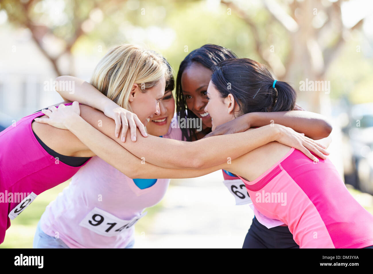 Female Runners Congratulating One Another After Race Stock Photo Alamy