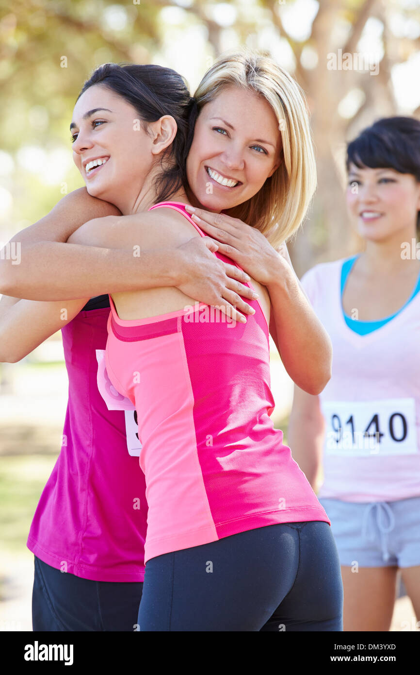 Female Runners Congratulating One Another After Race Stock Photo Alamy