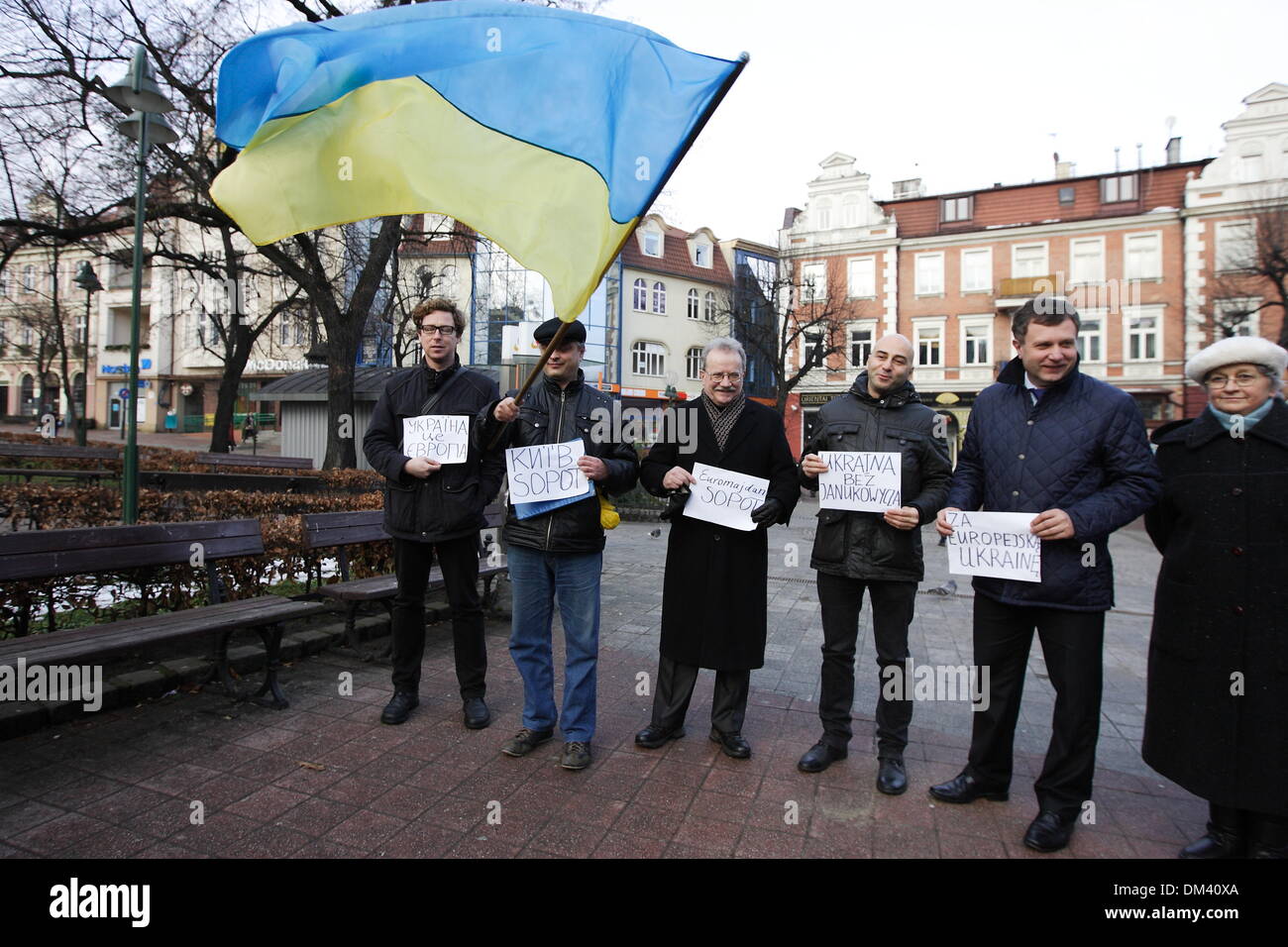 Sopot, Poland. 11th December 2013. Sopot's citizens supports Ukrainian Euromaidan protesters organising picket in city center. Mayor of Sopot Jacek Karnowski (blue jacket) takes part in the picket. Credit:  Michal Fludra/Alamy Live News Stock Photo