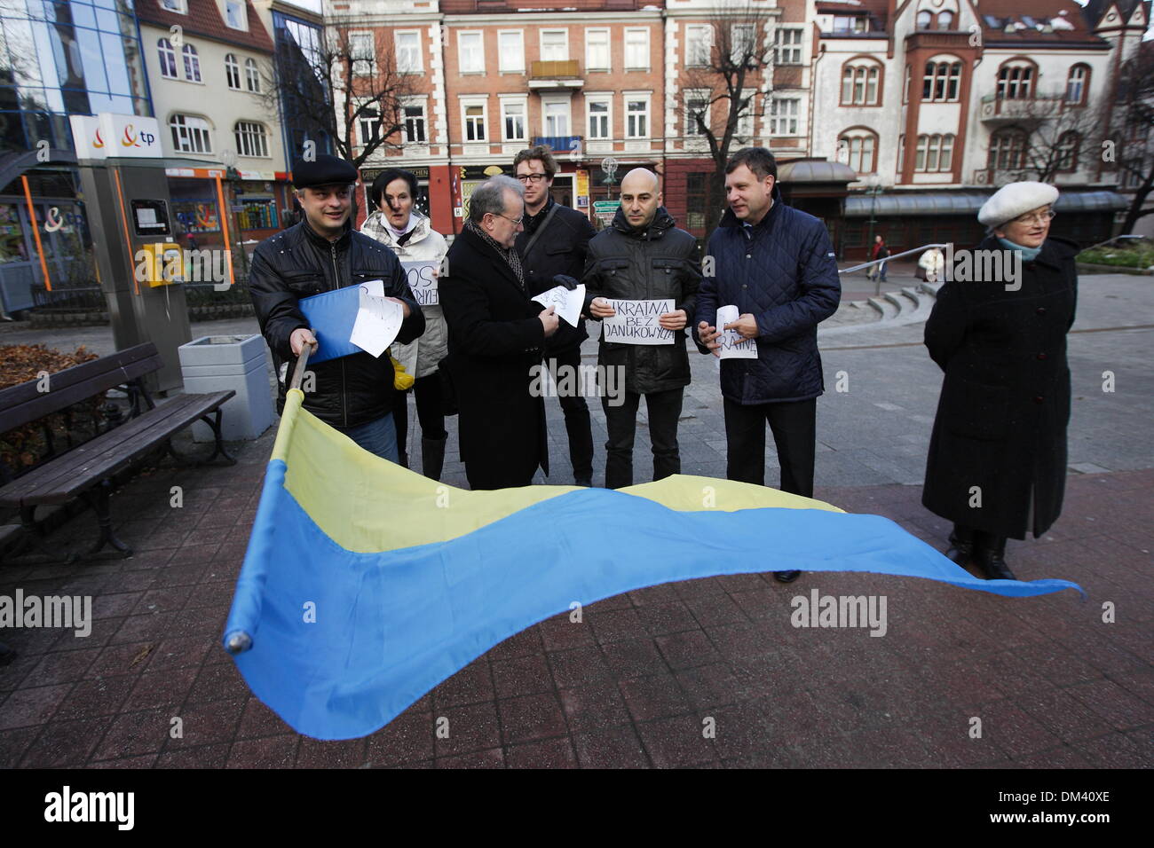 Sopot, Poland. 11th December 2013. Sopot's citizens supports Ukrainian Euromaidan protesters organising picket in city center. Mayor of Sopot Jacek Karnowski (blue jacket) takes part in the picket. Credit:  Michal Fludra/Alamy Live News Stock Photo