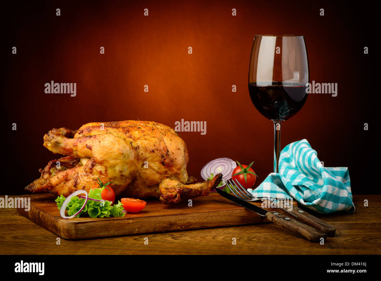 still life with traditional roasted chicken and red wine Stock Photo