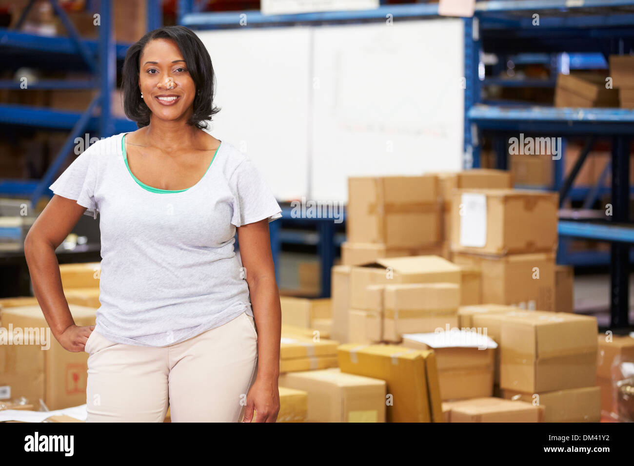 Portrait Of Worker In Distribution Warehouse Stock Photo