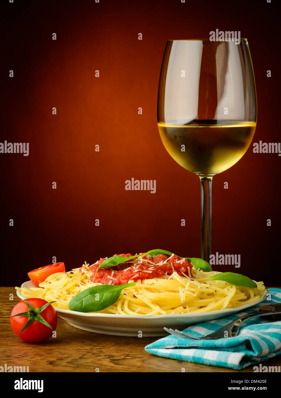 still life with traditional italian spaghetti pasta and white wine Stock Photo