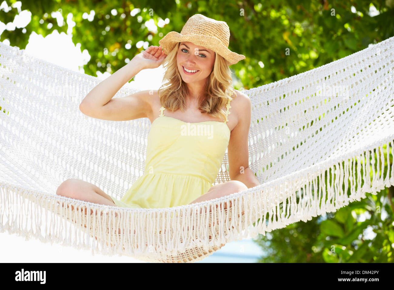 Woman relaxing in the sun hi-res stock photography and images - Alamy