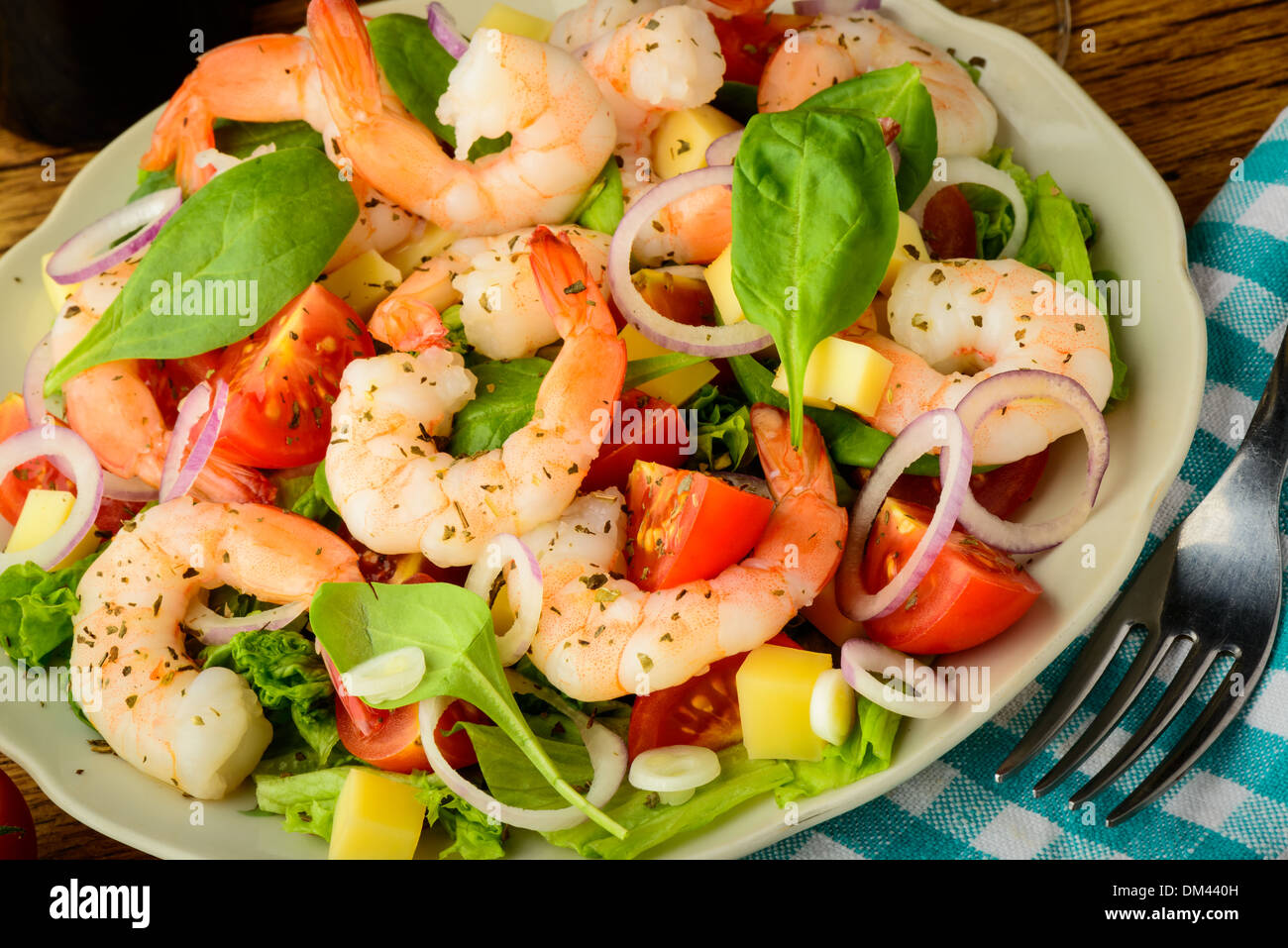 tasty meal with fresh and healthy prawn salad and vegetables Stock Photo