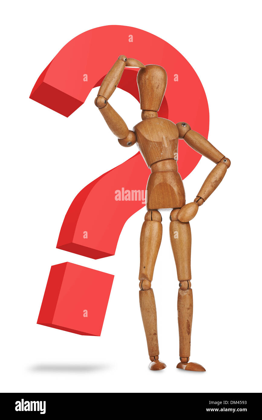 Wooden dummy with a red question mark Stock Photo