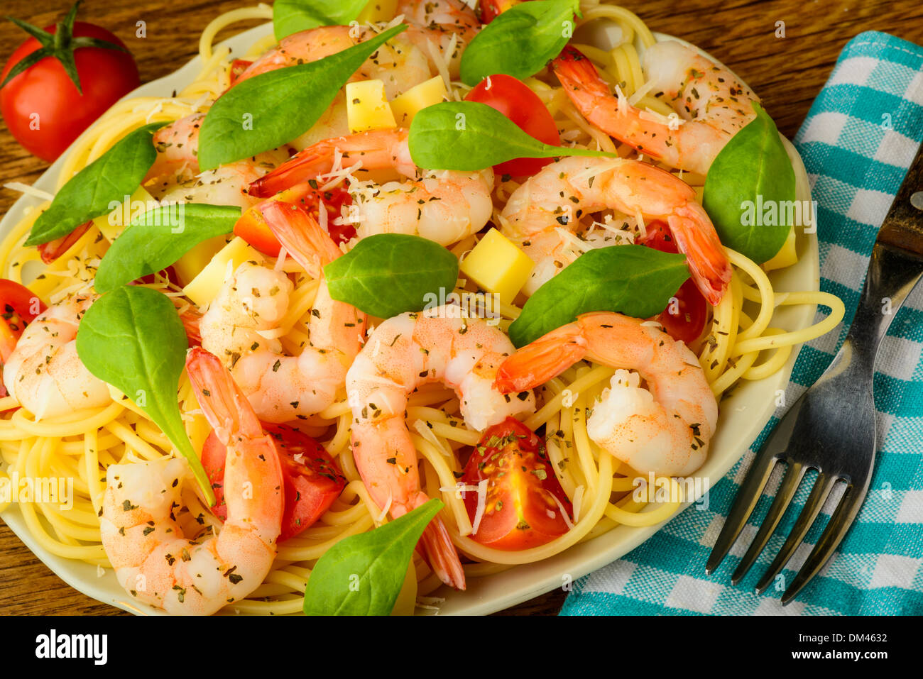 fresh and healthy seafood shrimps with italian spaghetti pasta Stock Photo