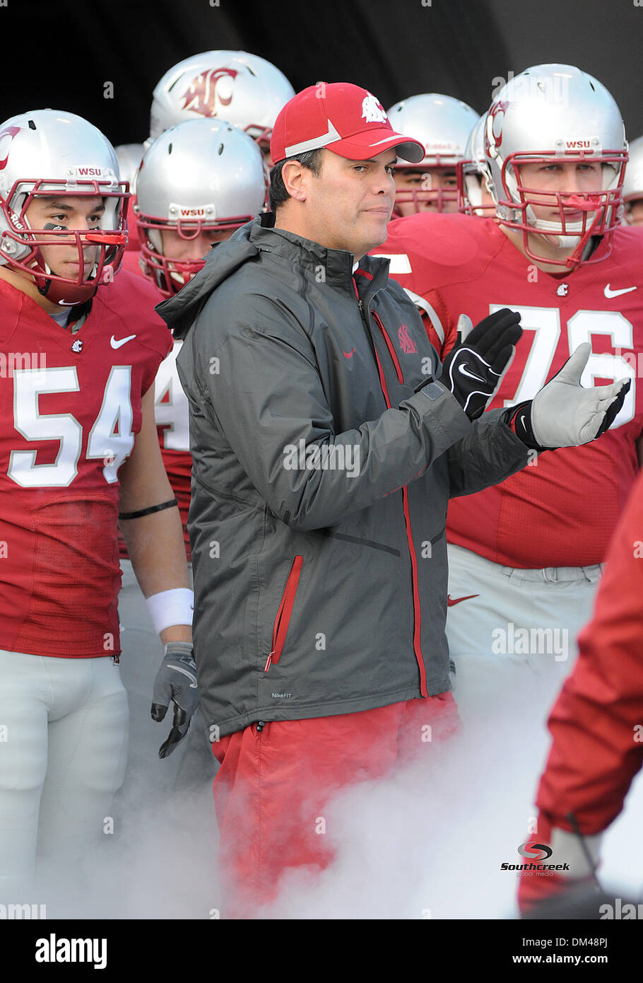 Washington State head coach Paul Wulff gets ready to take the field
