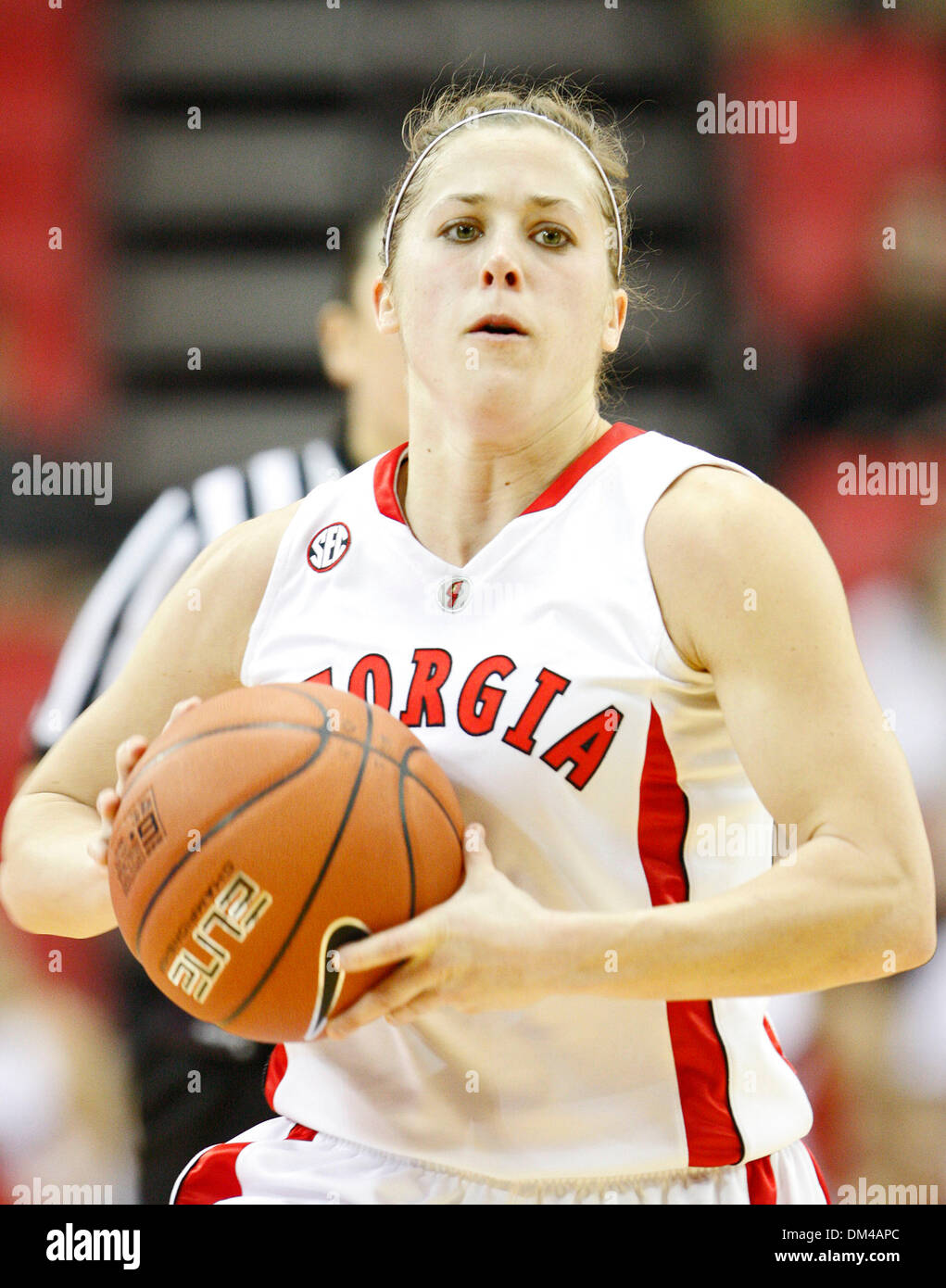 guard Ashley Houts (1) moves down the court at the game against