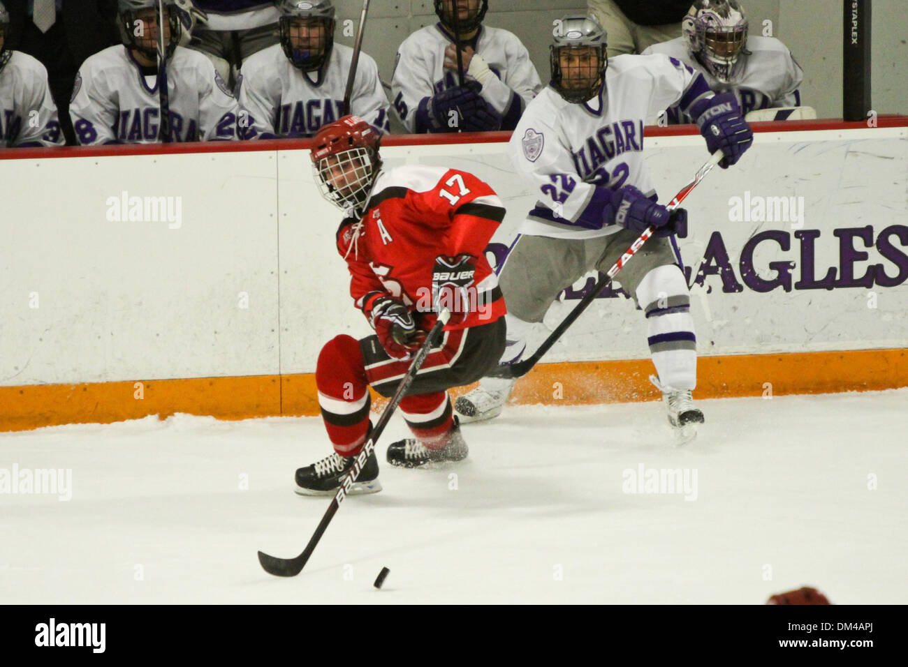 NCAA Non-Conference Game - SLU's Alex Curran (17) moves around NU's Bryan Haczyk (22) in the first period. NU leads the game 2-0. The game was held at Dwyer Arena in Niagara Falls, New York, United States of America. (Credit Image: © Nicholas Serrata/Southcreek Global/ZUMApress.com) Stock Photo