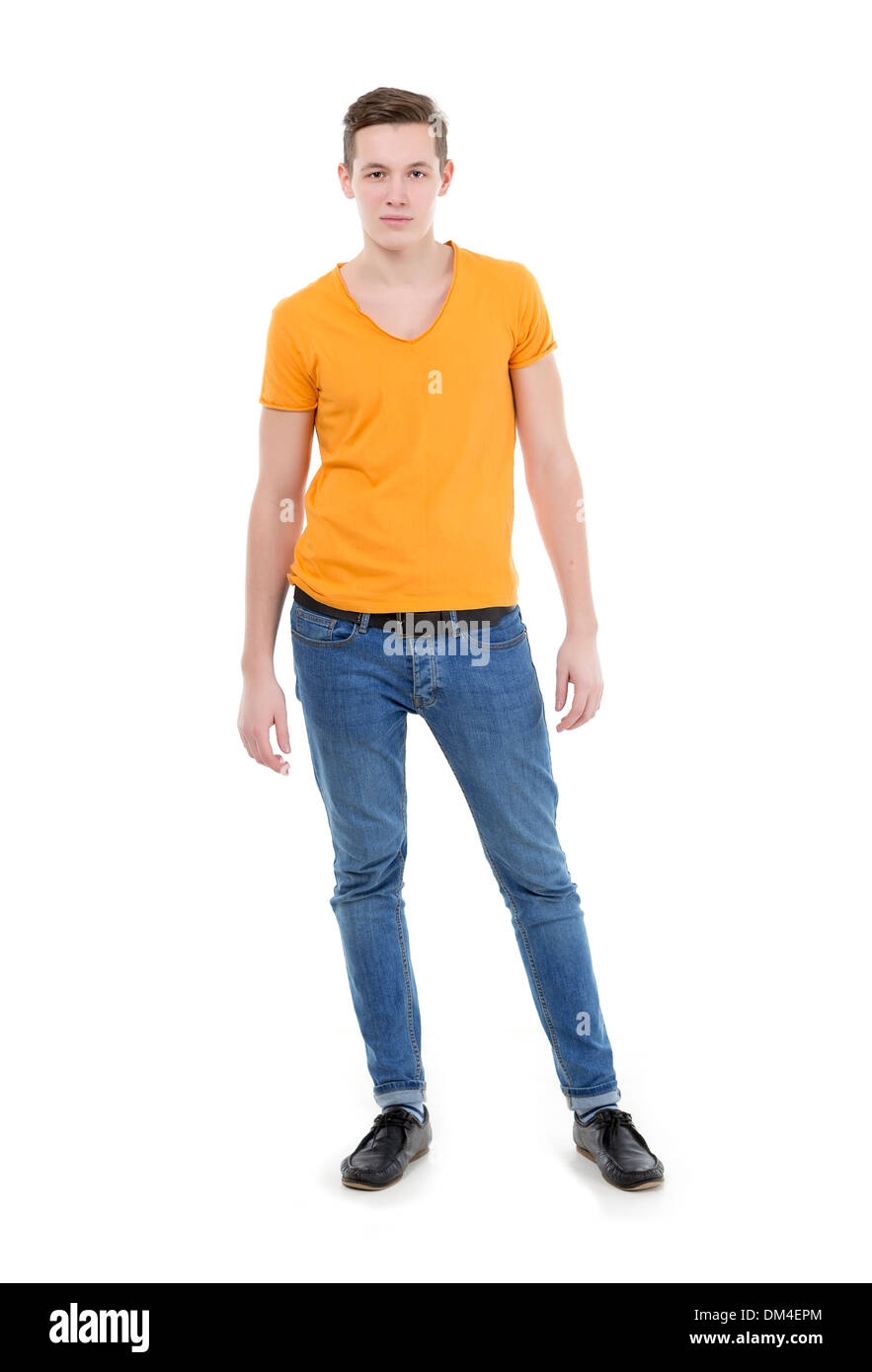 Man with yellow shirt and jeans hi-res stock photography and images - Alamy