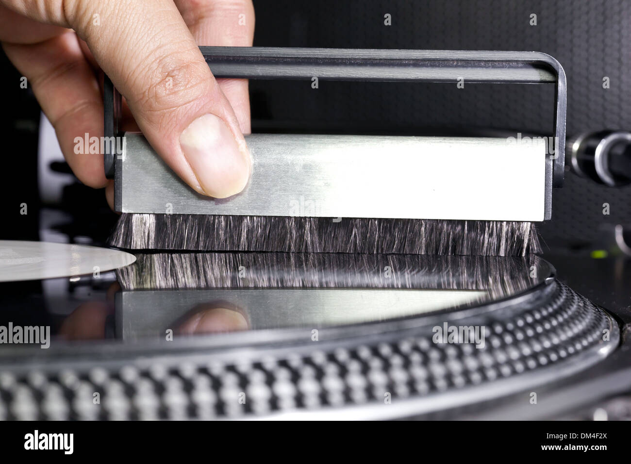 Cleaning vinyl record. Brush in hand Stock Photo Alamy