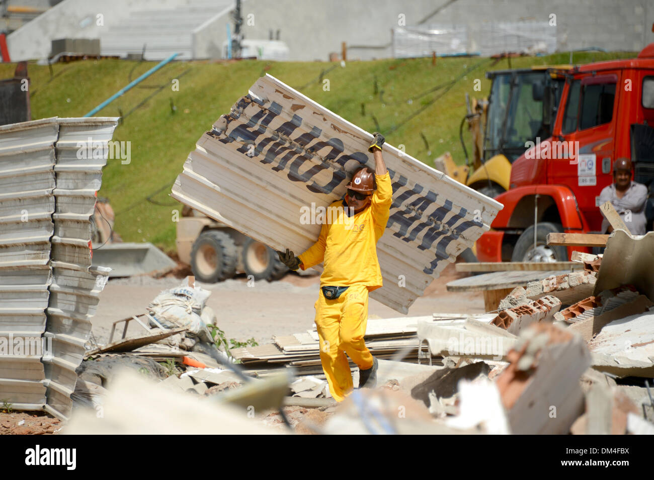 Natal, Brazil. 08th Dec, 2013. A construction worker is pictured at the construction site of 'Arena das Dunas' in Natal, Brazil, 08 December 2013. Photo: MARCUS BRANDT/dpa/Alamy Live News Stock Photo