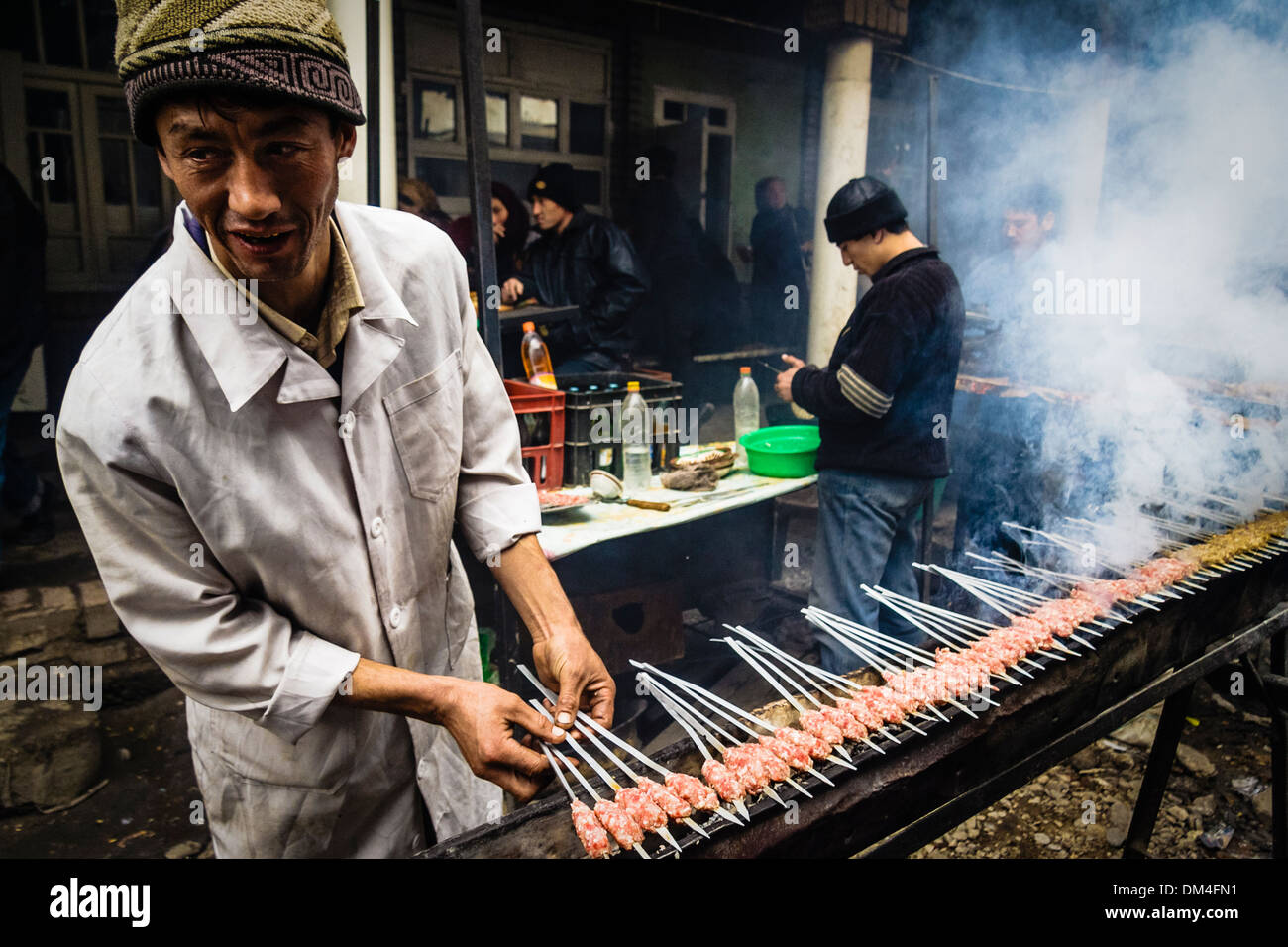 Shashlik Shish kebab vendor at Urgut bazaar, Uzbekistan Stock Photo