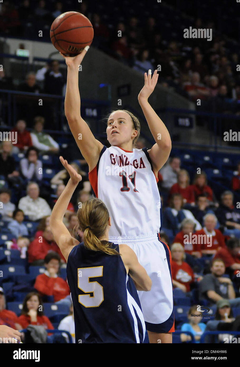 Gonzaga's Janelle Bekkering (11) makes a basket over UC Irvine's