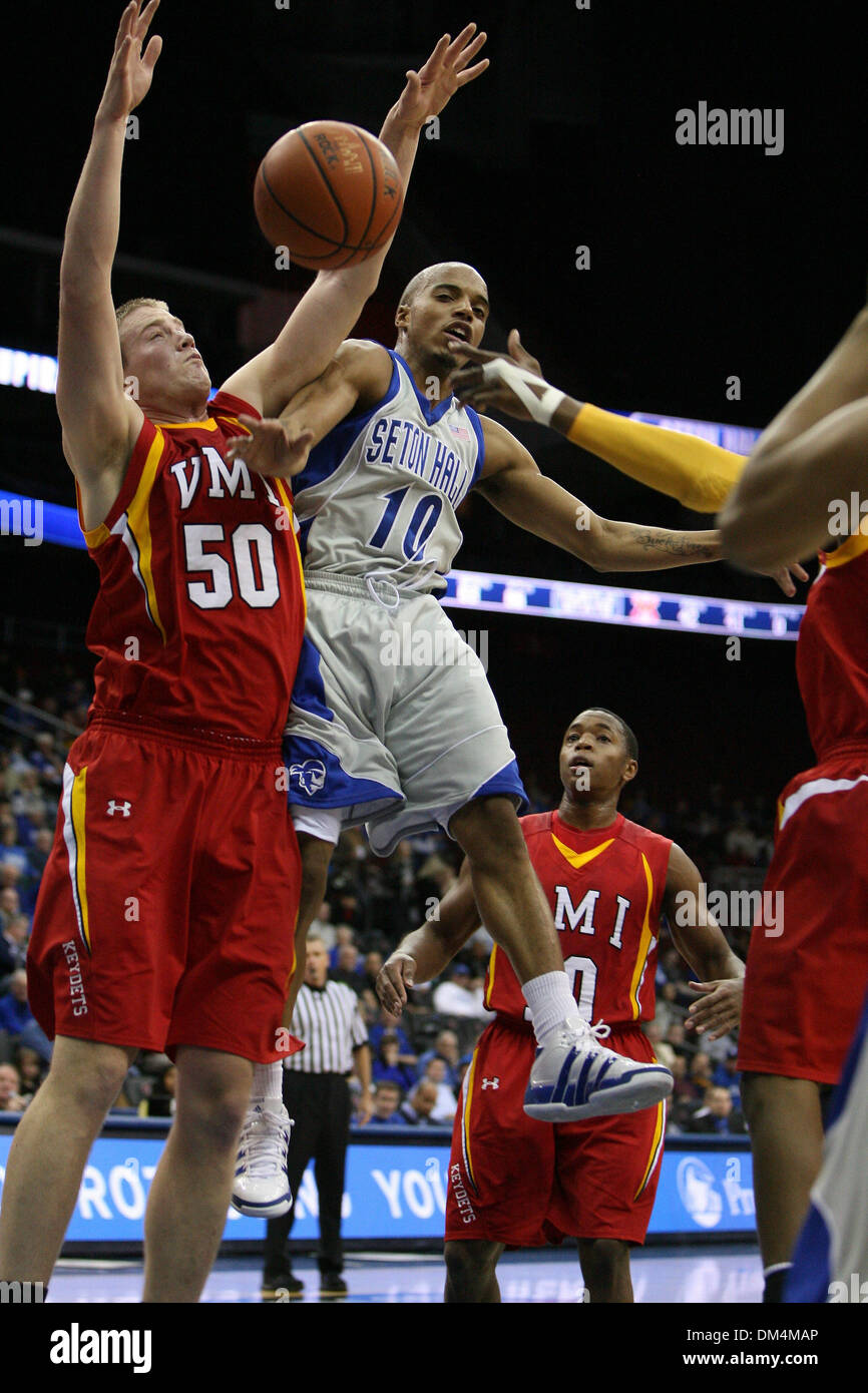 Dec. 12, 2009 - Newark, New Jersey, U.S - 12 December 2009:  Seton Hall guard Jordan Theodore #10 is fouled while driving to the basket during game action between the VMI Keydet and Seton Hall Pirates  held at the Prudential Center in Newark, New Jersey. The VMI Keydets trails the Seton Hall Pirates 64-51 at the half. .Mandatory Credit: Alan Maglaque / Southcreek Global (Credit Ima Stock Photo
