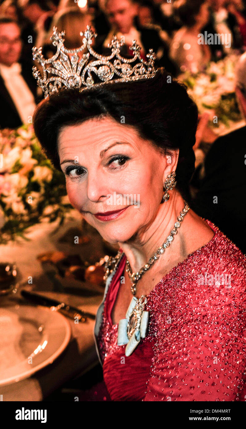 Queen Silvia of Sweden , who will be 70 on December 23rd 2013 is seen here at  The Nobel Prize Banquet in the Stockholm Town Hall on  December 10th 2013 Stock Photo