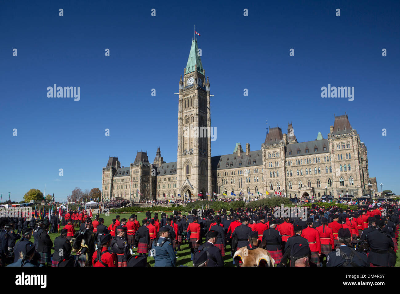 Canada, North America, Hill Center Block, Ottawa, Police, celebration, ceremony, city, crowd, parliament, red, building Stock Photo