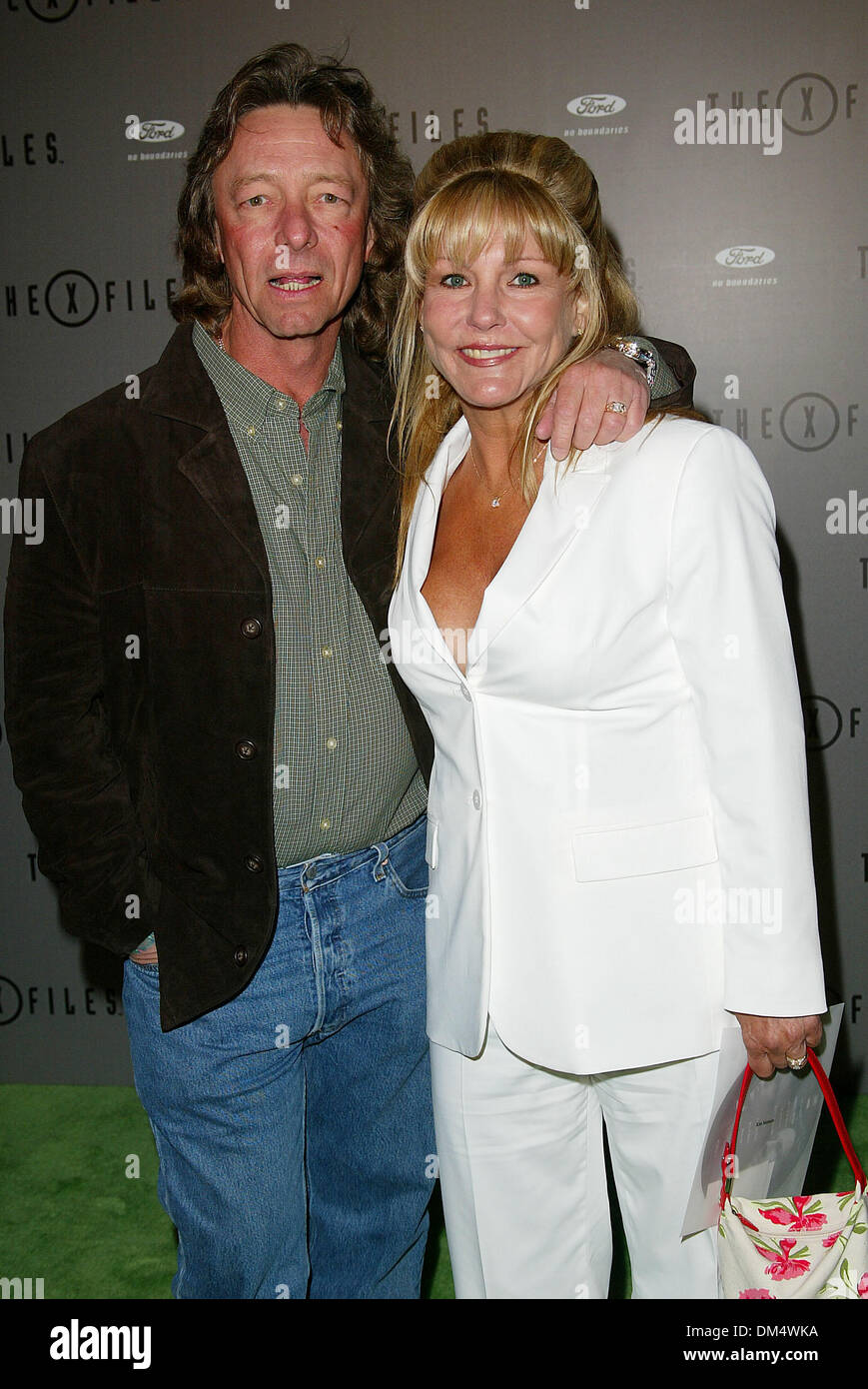 Apr. 27, 2002 - Los Angeles, CALIFORNIA - THE X-FILES SERIES FINALE WRAP PARTY.AT THE HOUSE OF BLUES IN LOS ANGELES, CA.DIRECTOR KIM MANNERS AND WIFE. FITZROY BARRETT /    4-25-2002        K24854FB         (D)(Credit Image: © Globe Photos/ZUMAPRESS.com) Stock Photo