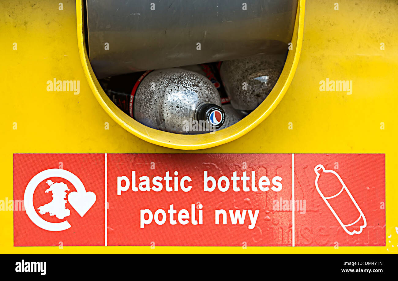 Plastic bottle recycling with sign in English and Welsh, Six Bells, Wales, UK Stock Photo