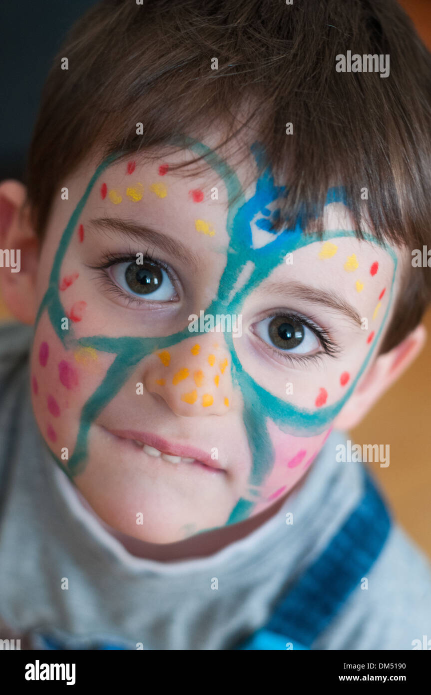 Child with painted face portrait Boy Stock Photo