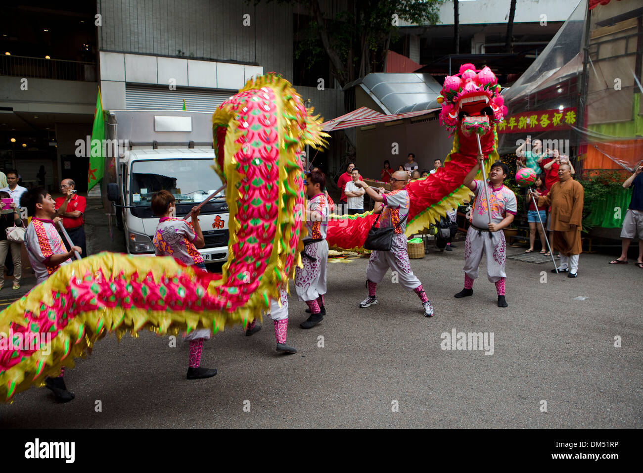 Traditional dragon dance as part of the Chinese New Year celebrations, Chinatown, Singapore. Stock Photo