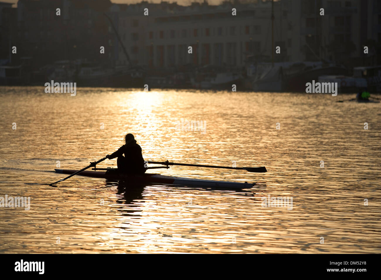 Early morning rowers on the river. Stock Photo