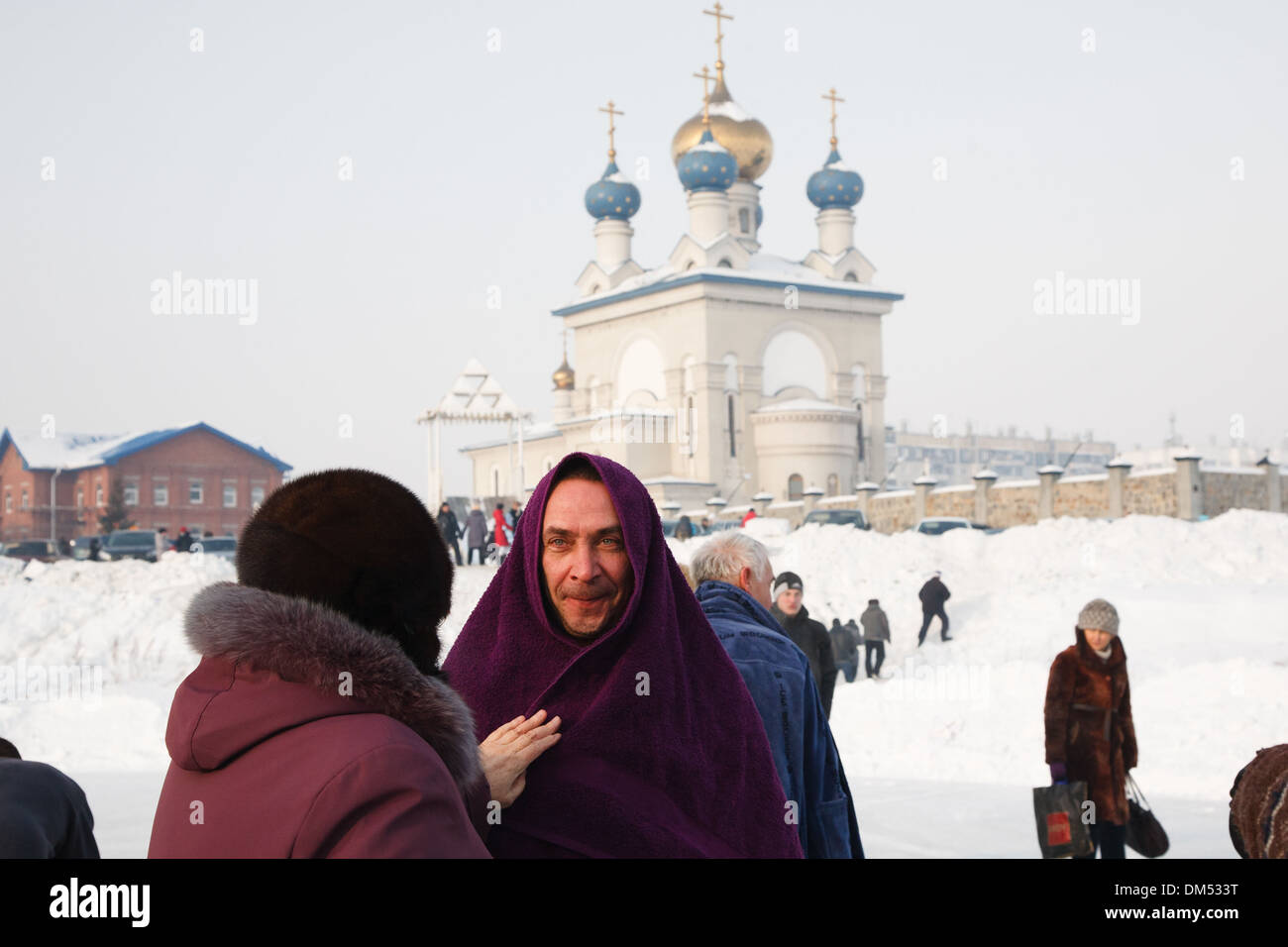 A man just had an Epiphany bathe in an ice hole called Jordan in Chelyabinsk city, Urals, Russian Federation Stock Photo