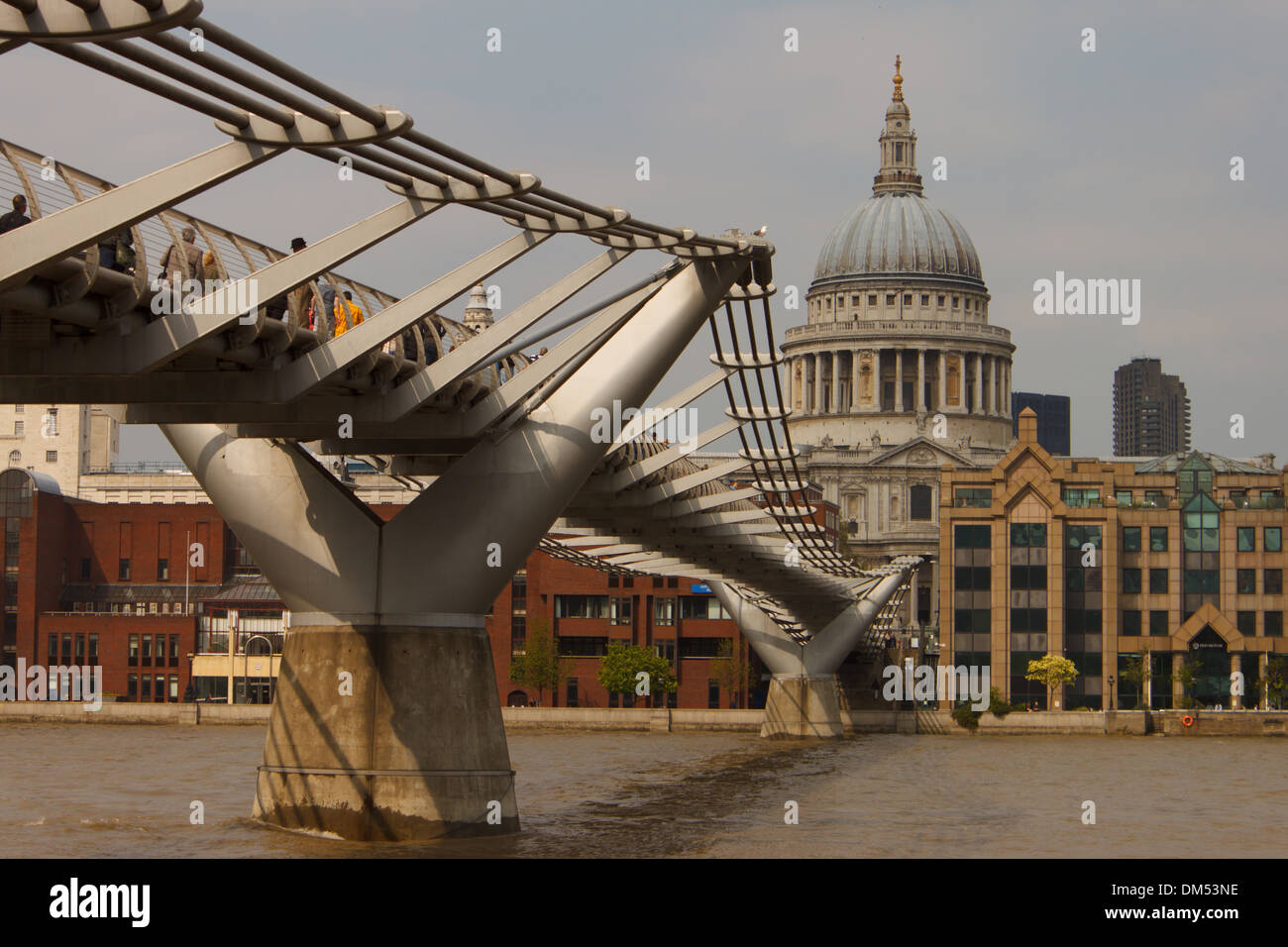 Millenium Bridge crosses the Thames towards St Paul's Cathedral Stock