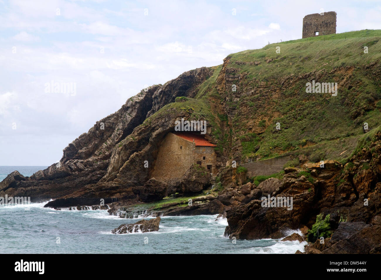 Santa Justa Beach and old monastery near the town of Ubiarco, Cantabria, Spain. Stock Photo