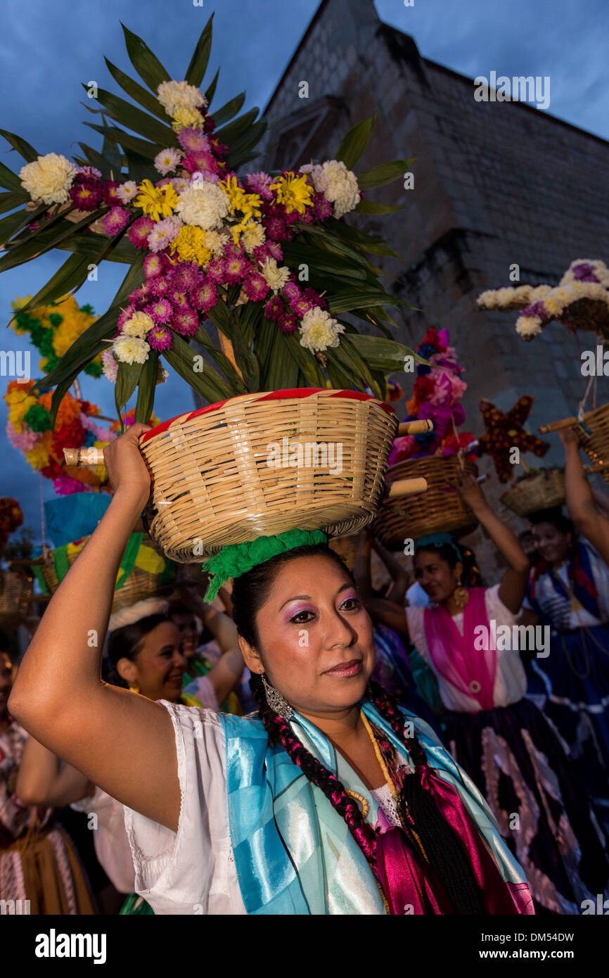 Young women dressed in traditional costumes parade in a comparsas during the Day of the Dead Festival in Oaxaca, Mexico. Stock Photo