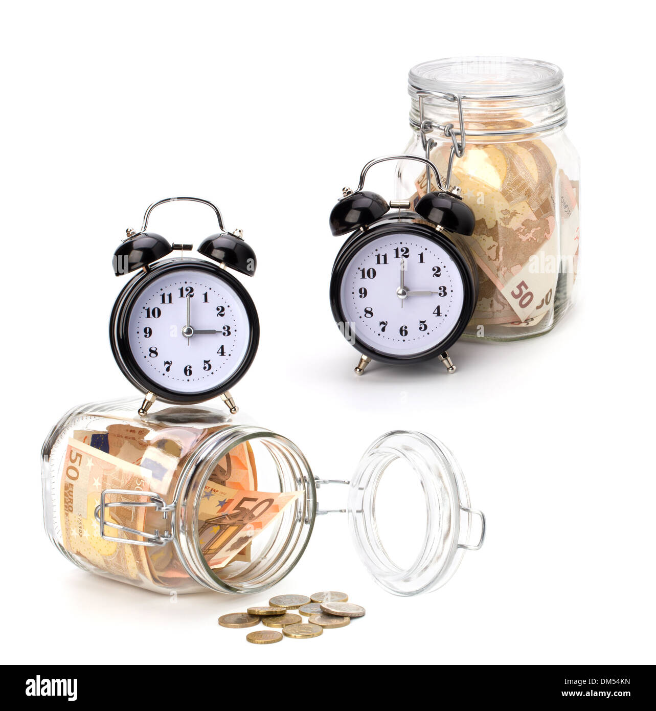 Money accumulation concept. Money and alarm clock isolated on white background. Stock Photo
